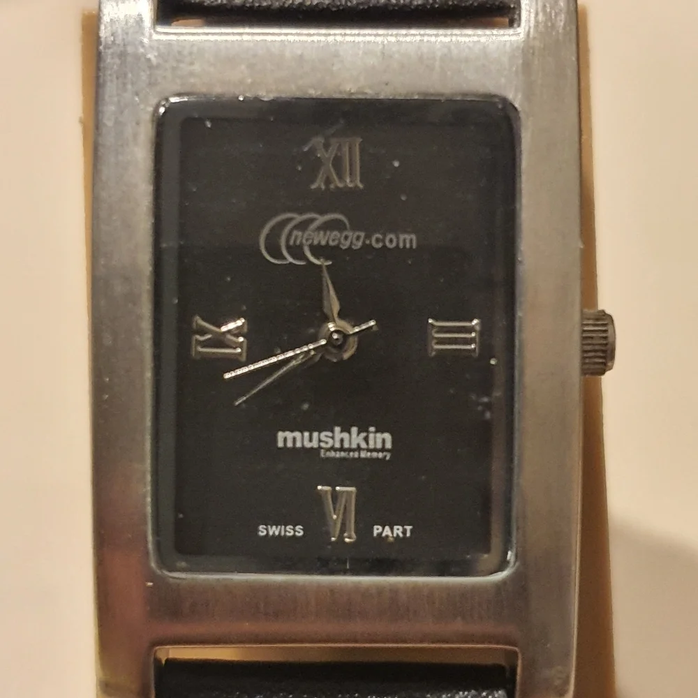 10/$20 Newegg.com Silver/Black Leather Promotional Men's Tank Watch